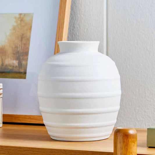 8-inch white ceramic vase with a vertical ribbed texture.